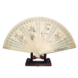 Wooden fan with punched...