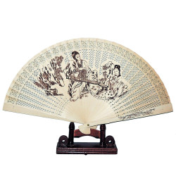 Wooden fan with punched...
